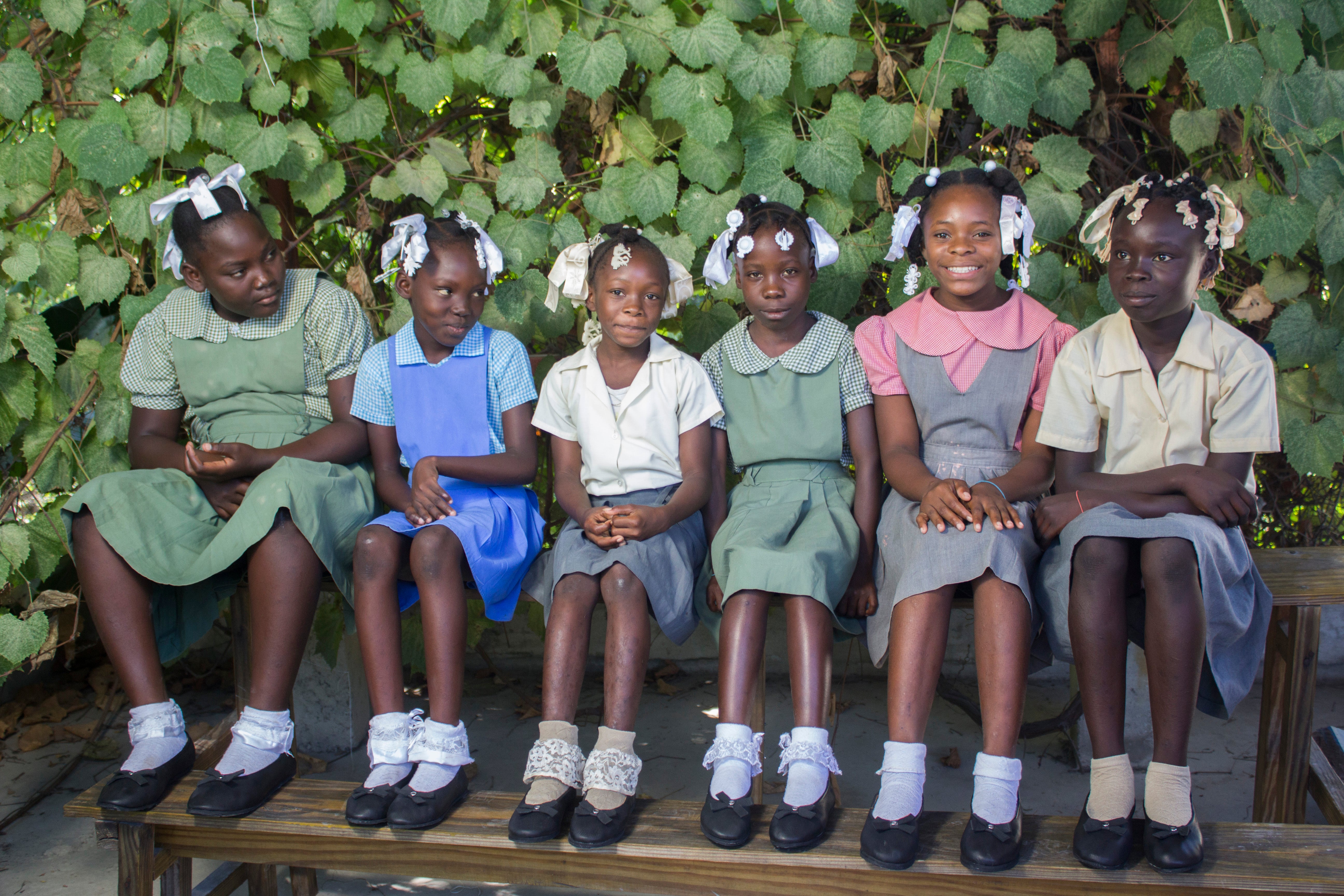 school children walking in haiti.