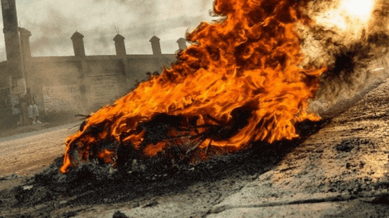smoke, fire, protests.