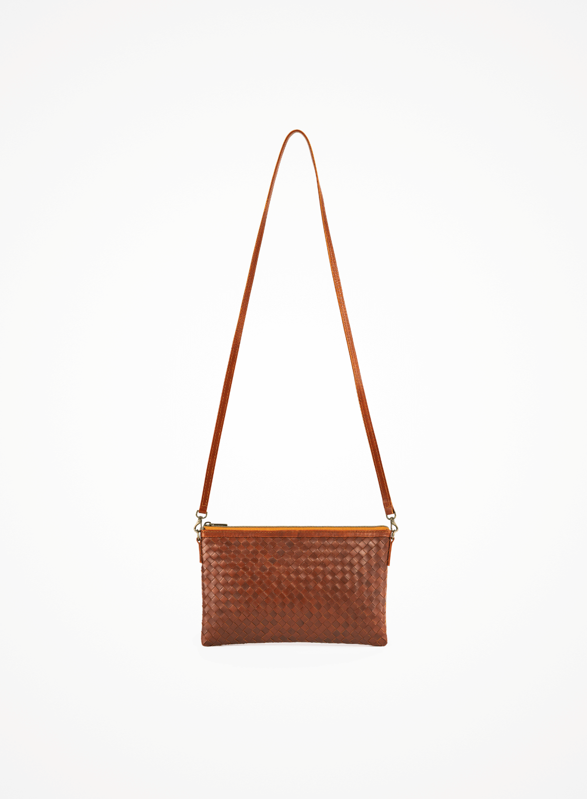 Brown woven handbag with a strap on a white background