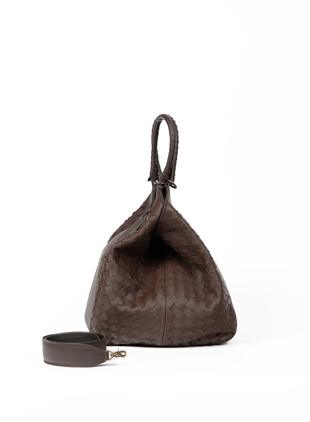 Brown textured handbag with a strap on a white background