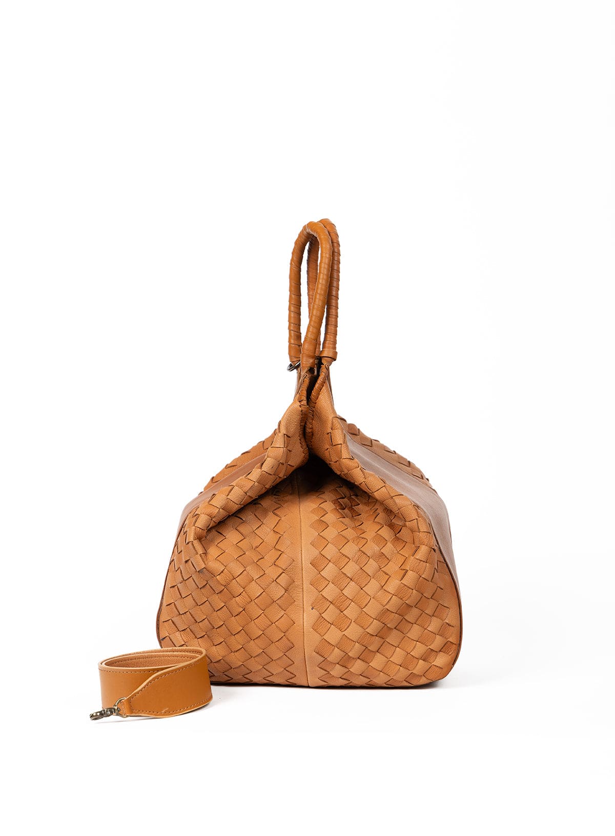 Two-tone-camel woven handbag with matching strap on a white background
