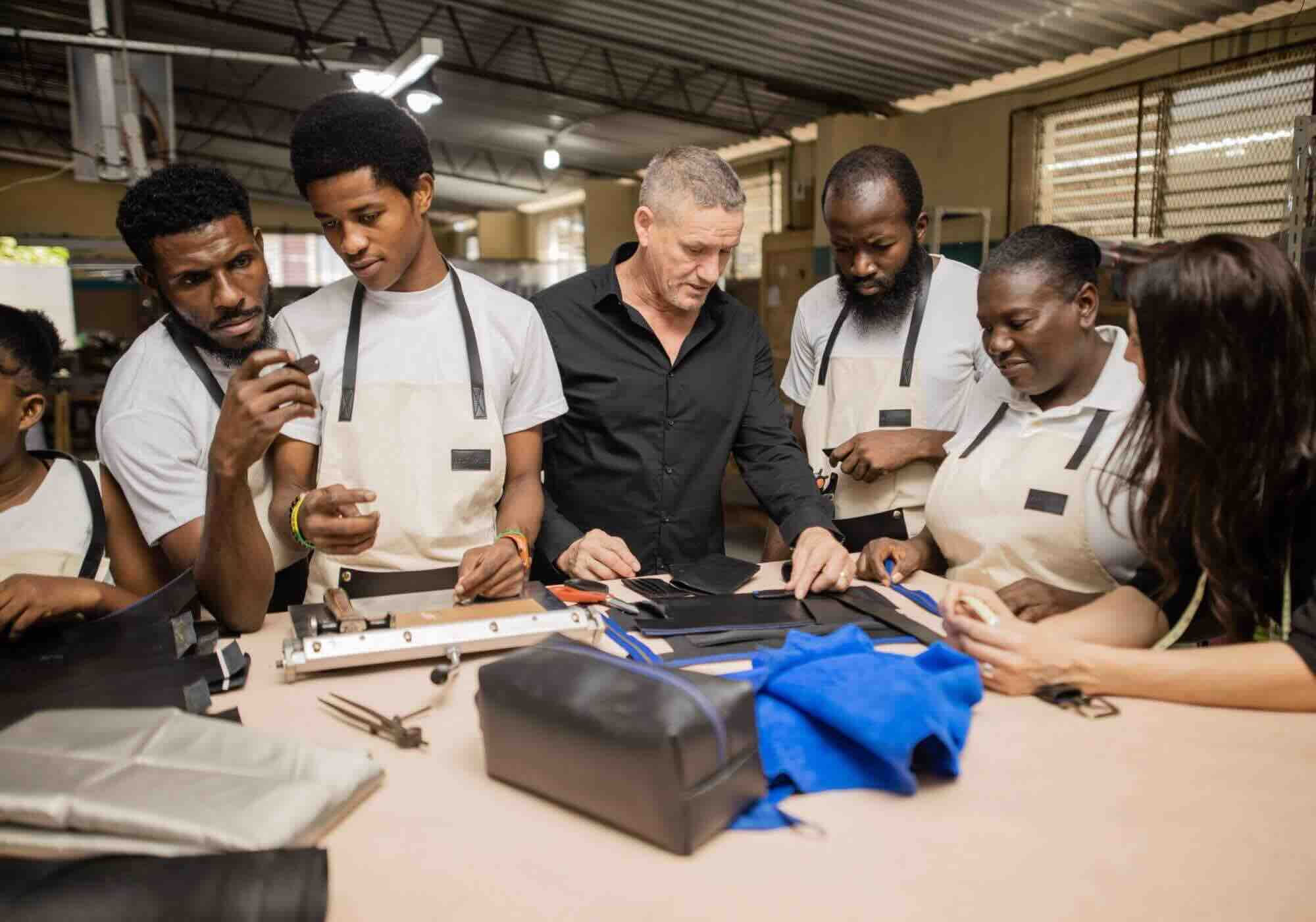 Billy Collection factory group working on leather goods