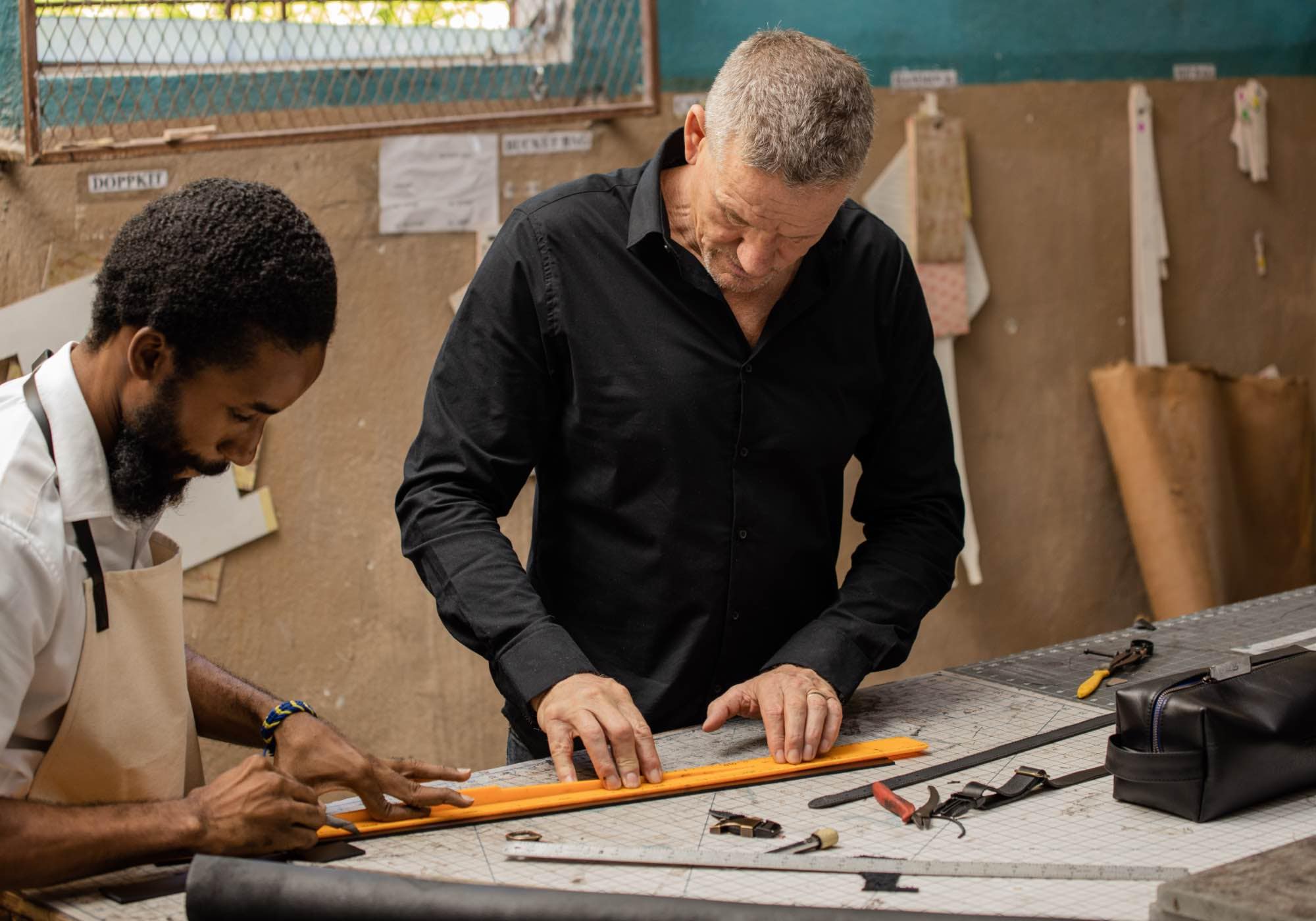 Billy Collection Haitian artisans working in factory