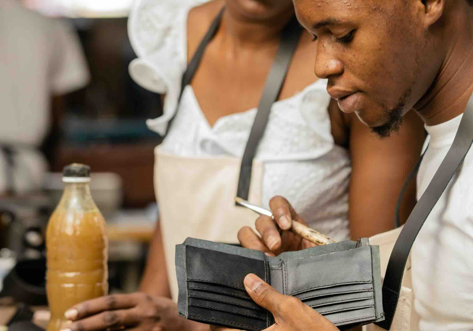 Billy Collection wallet being crafted in factory