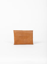 coin pouch from ethically crafted accessories in cognac color showcasing back view.