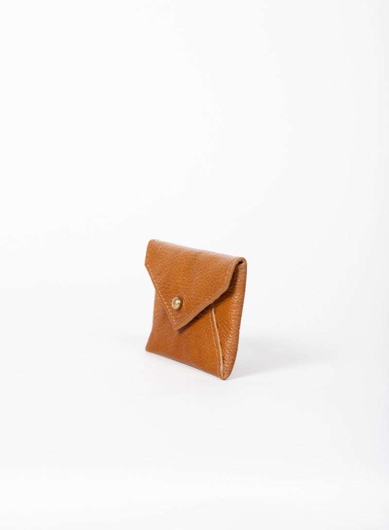 coin pouch from ethically crafted accessories in cognac color showcasing side view.