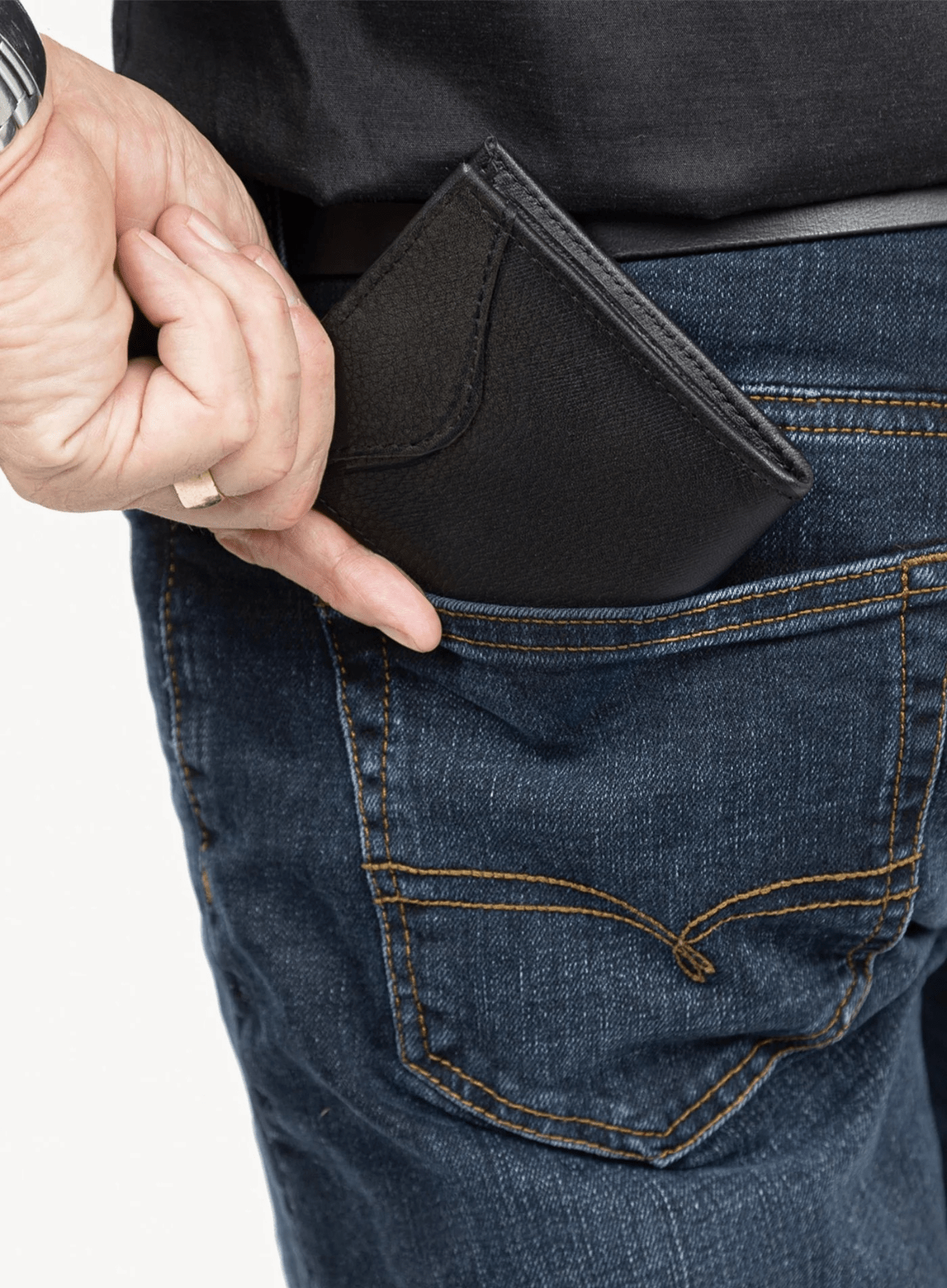 mens wallet being put in pocket