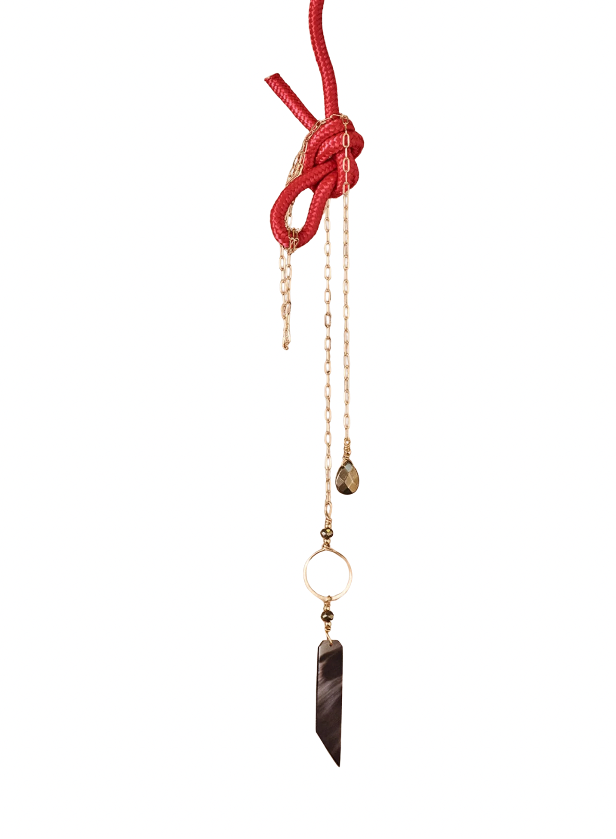 Lariat platted gold necklace with natural stone on a white background.