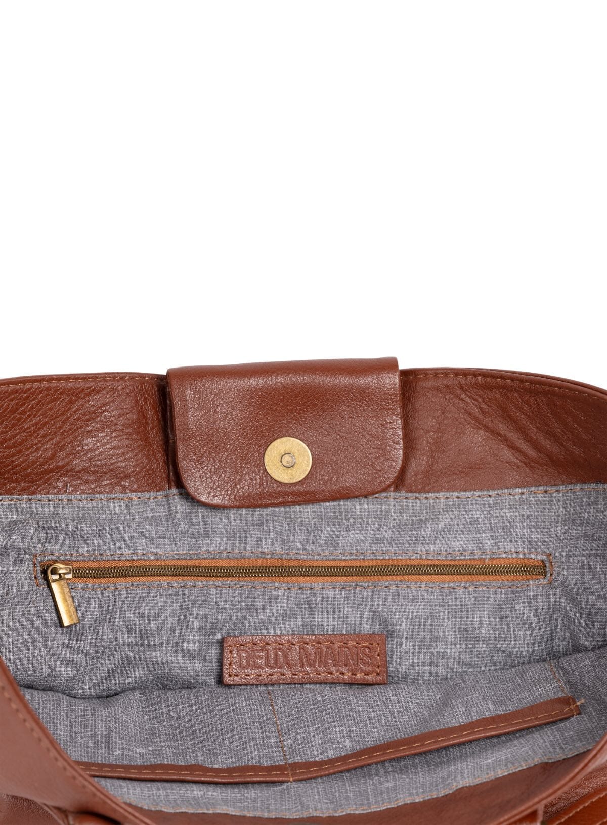 Brown tote bag with a visible brand logo on a white background