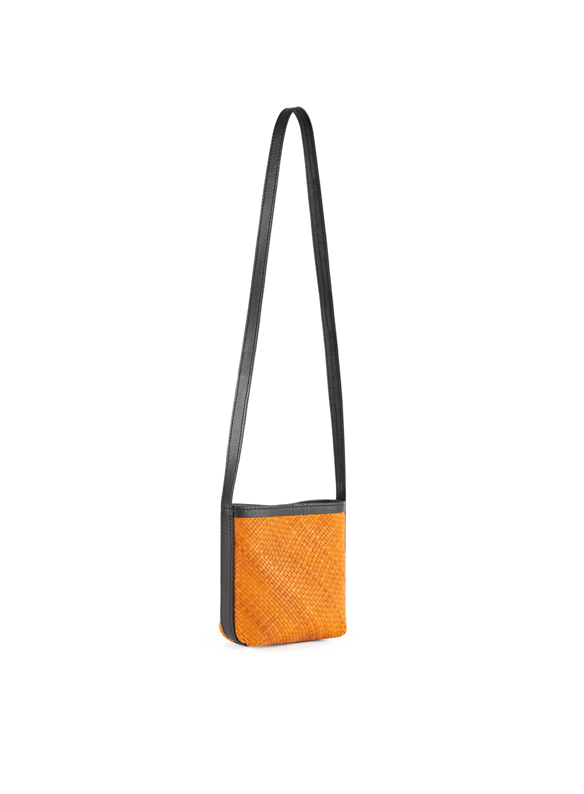 Side of woven crossbody bag with a black strap on a white background