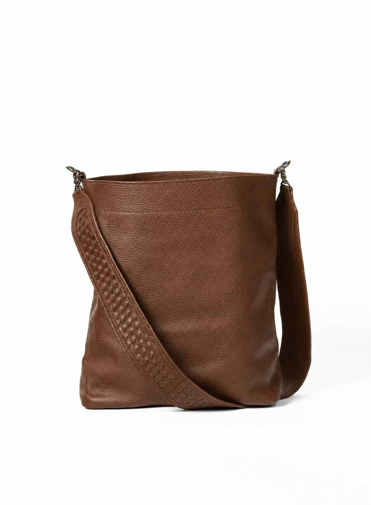 A brown leather bucket bag with a textured woven pattern on the strap and silver-tone metal hardware, shown on a plain white background.
