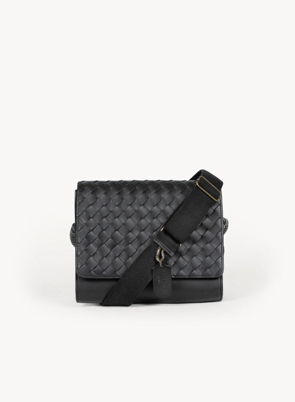 the colonel crossbody in black showcasing the front-view details and tag.