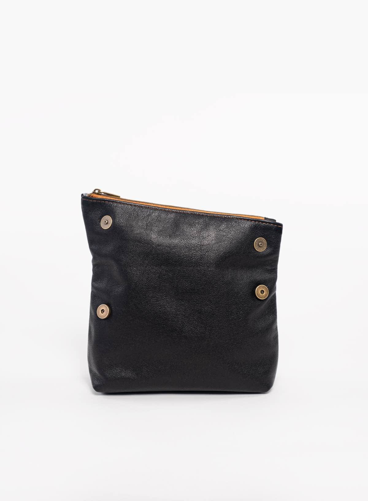 Black leather makeup bag on a white background