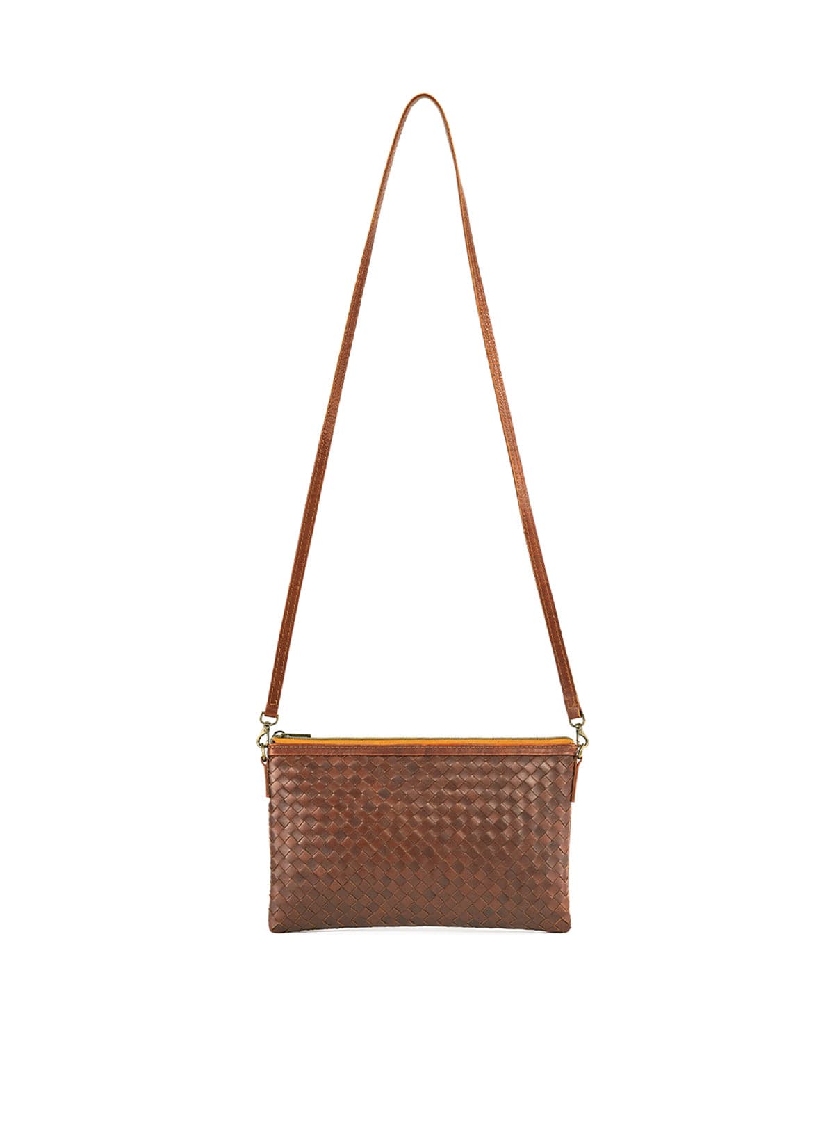 Brown woven crossbody and clutch with a strap on a white background
