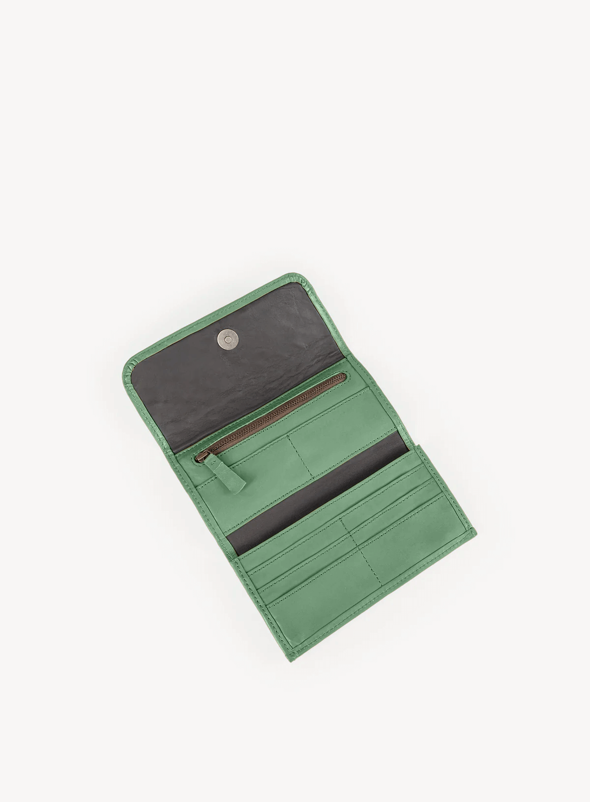 woven wristlet in sage green interior view with white background