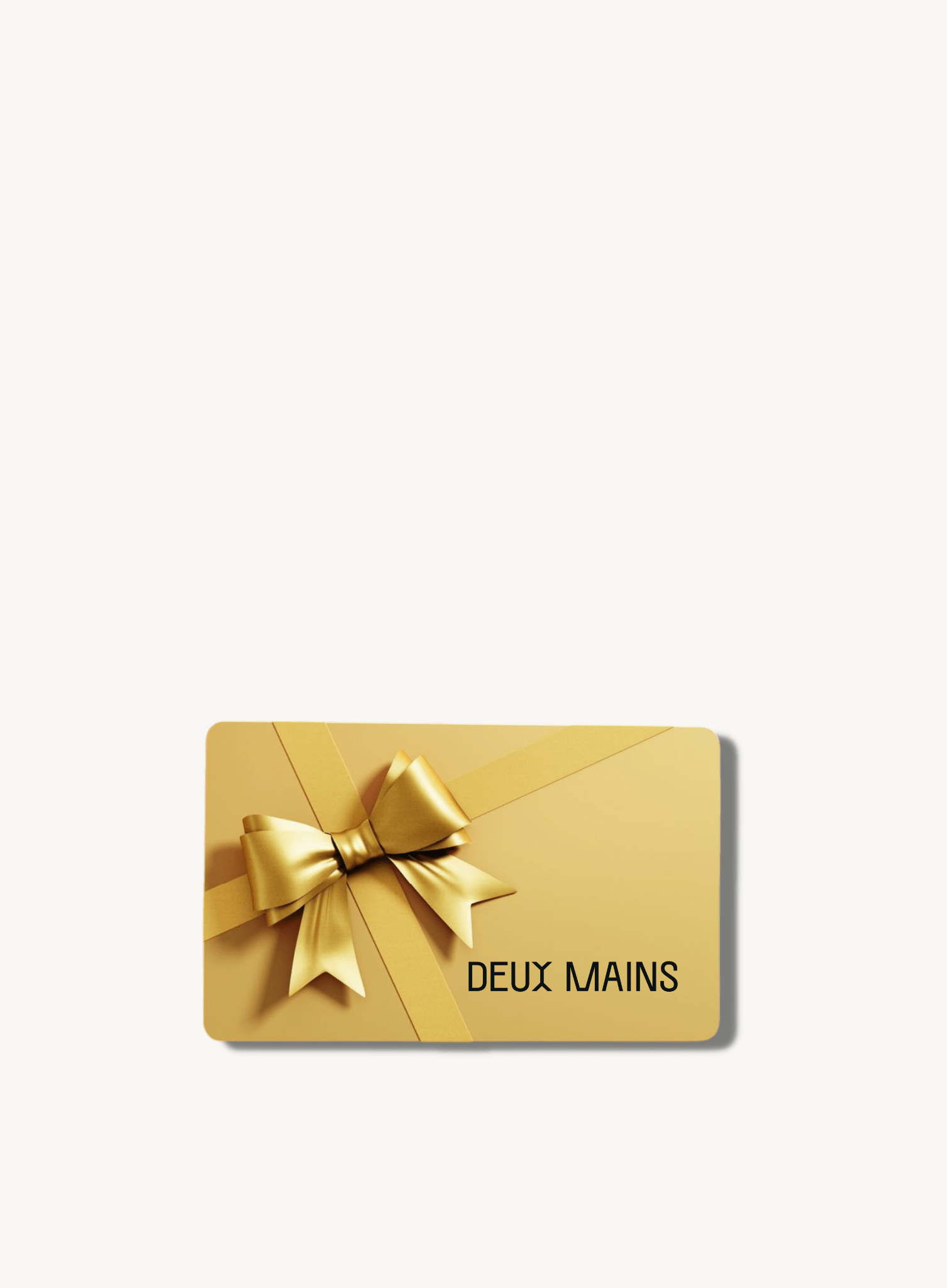 Deux Mains gift card with gold bow.