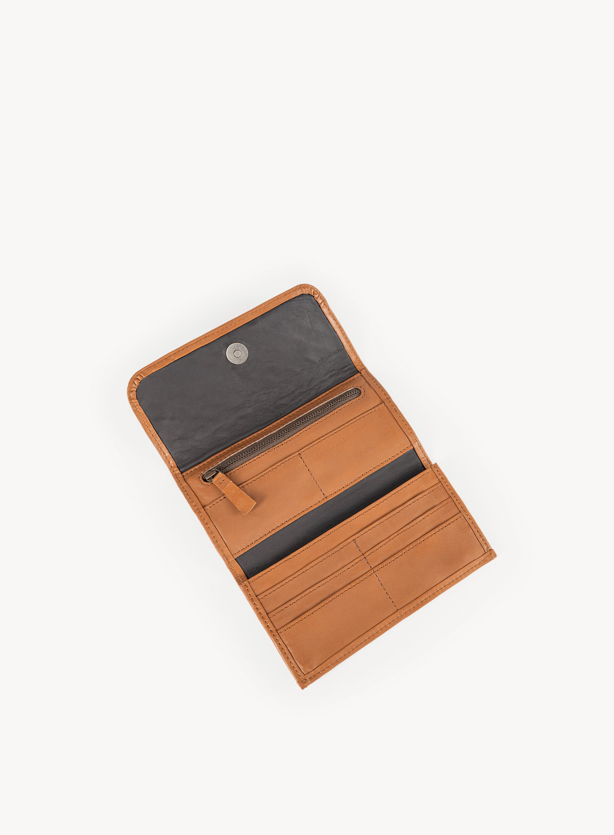 Cognac leather wallet on a white background