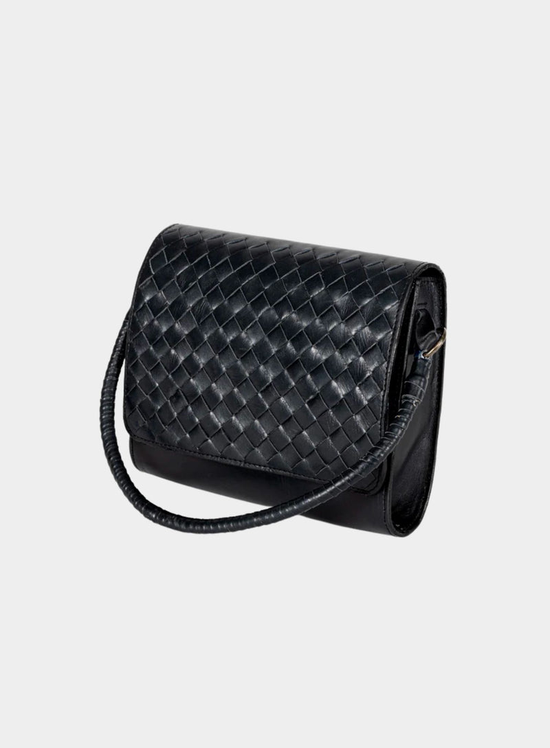 Ideal Crossbody with leather wrapped handle on womens weaved handbag in black showcasing side view.
