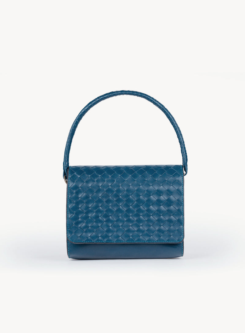 Ideal Crossbody with leather wrapped handle on womens weaved handbag in blue showcasing front view.