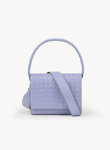 Ideal Crossbody with additional strap on womens weaved handbag in lilac showcasing front view.