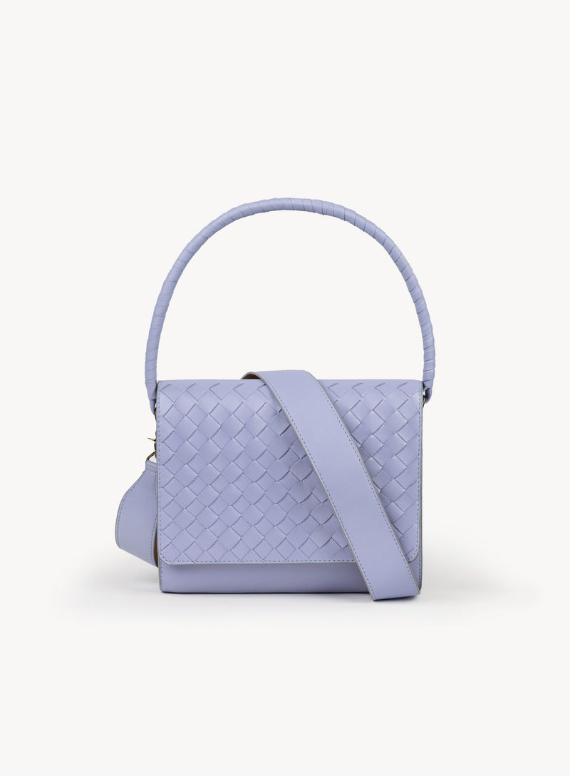 Ideal Crossbody with additional strap on womens weaved handbag in lilac showcasing front view.