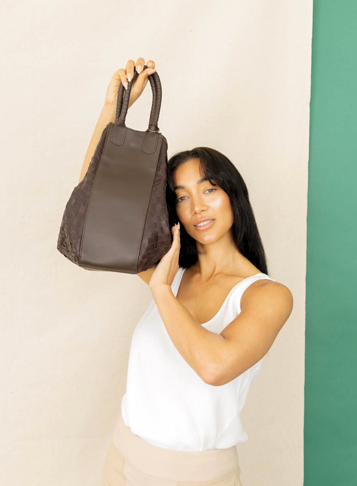 all day leather tote in camel from our fall collection showcased by a model side view, perfect gift for a loved one.
