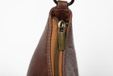 baguette bag from womens bags in brown showcasing exterior view.