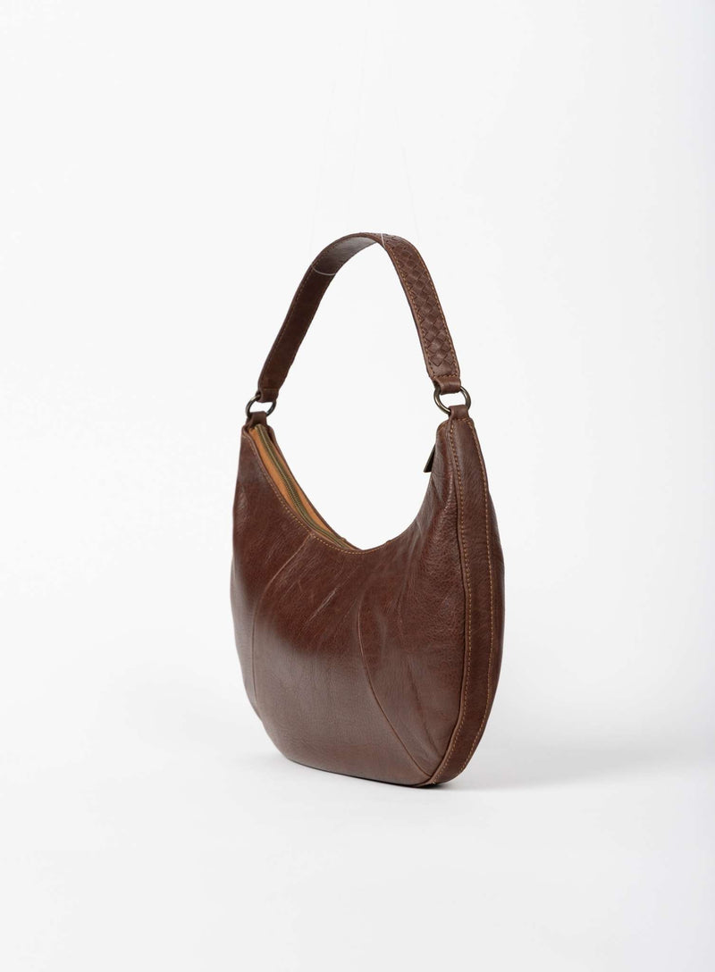 baguette bag from womens bags in brown showcasing side view.