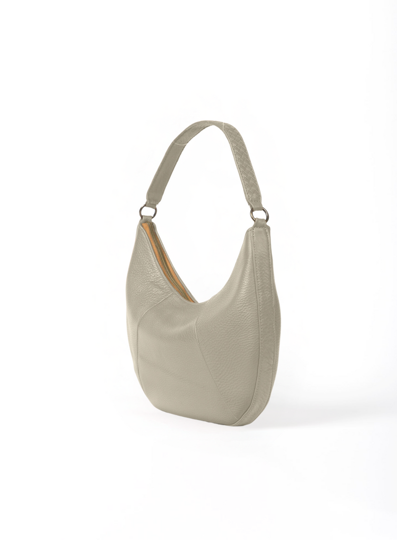 baguette bag from womens handbags in bone color showcasing side view.