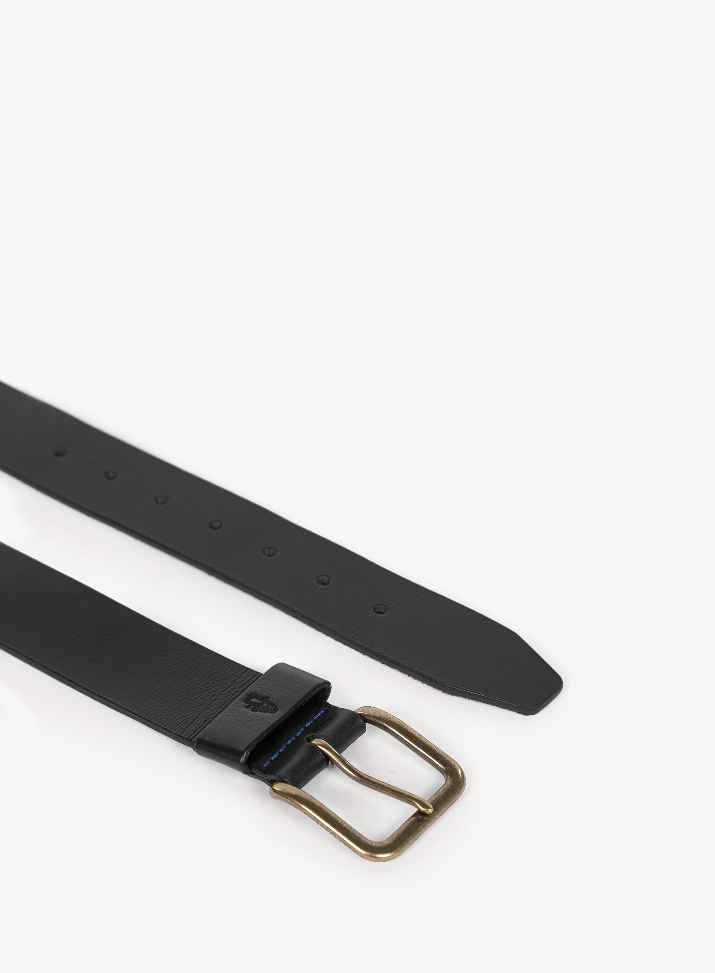 black leather belt with brass buckle and blue stitching detail.ed closure