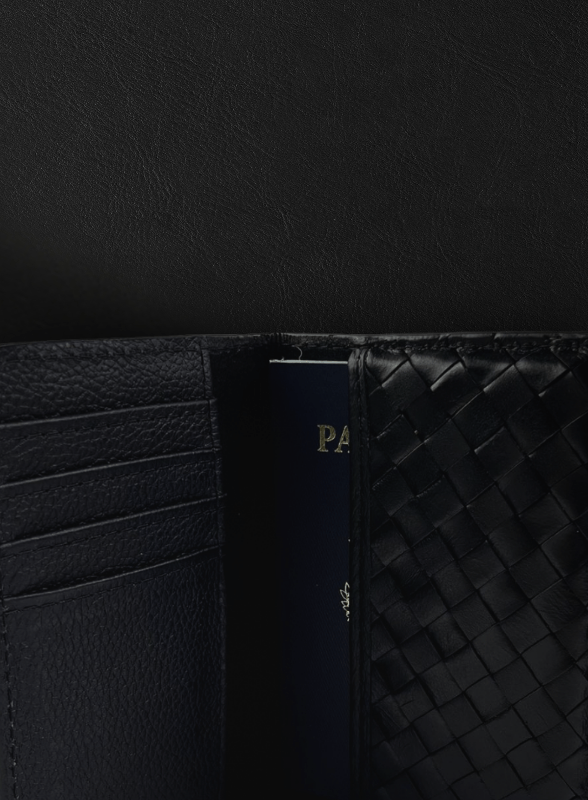 Close-up of a black woven passport holder