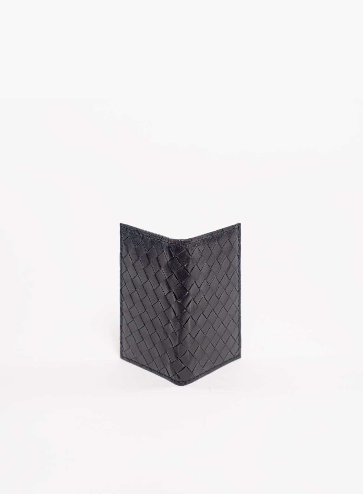 modern woven wallet in black side view from fall collection.