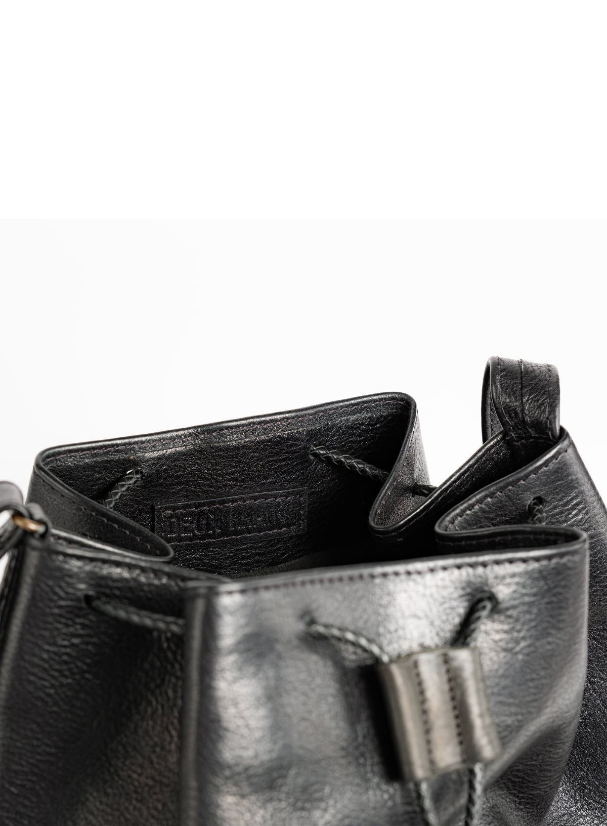 womens leather bucket bag in black from fall collection showcasing interiorview.