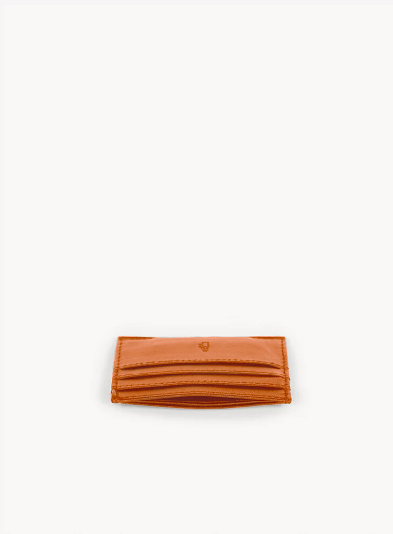 FILE--A handbag and wallets are showcased at a fashion store of