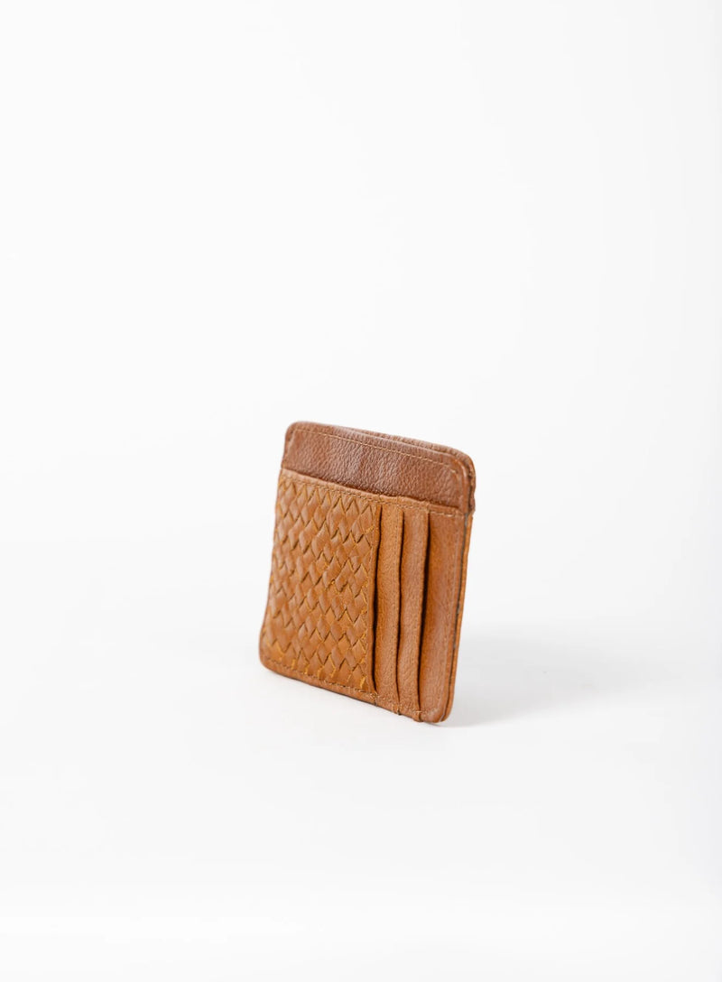 card holder in cognac from ethically crafted accessories showcasing side view.