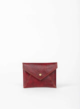 coin pouch from ethically crafted accessories in bordeaux color showcasing front view.