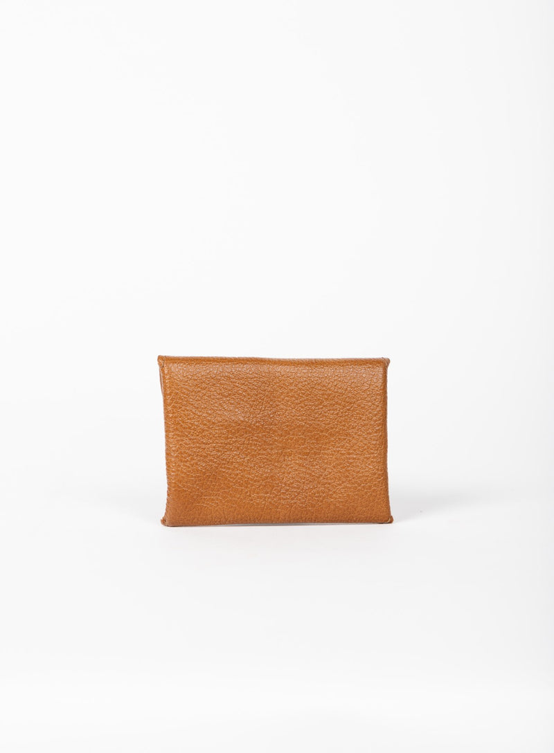 coin pouch from ethically crafted accessories in cognac color showcasing back view.