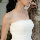 elene teardrop earrings worn by model for a wedding photoshoot.