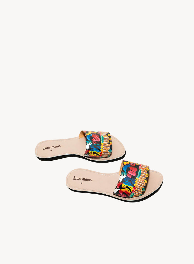 Hand painted slide sandals  from the sandal collection made by artisans with repurposed materials.
