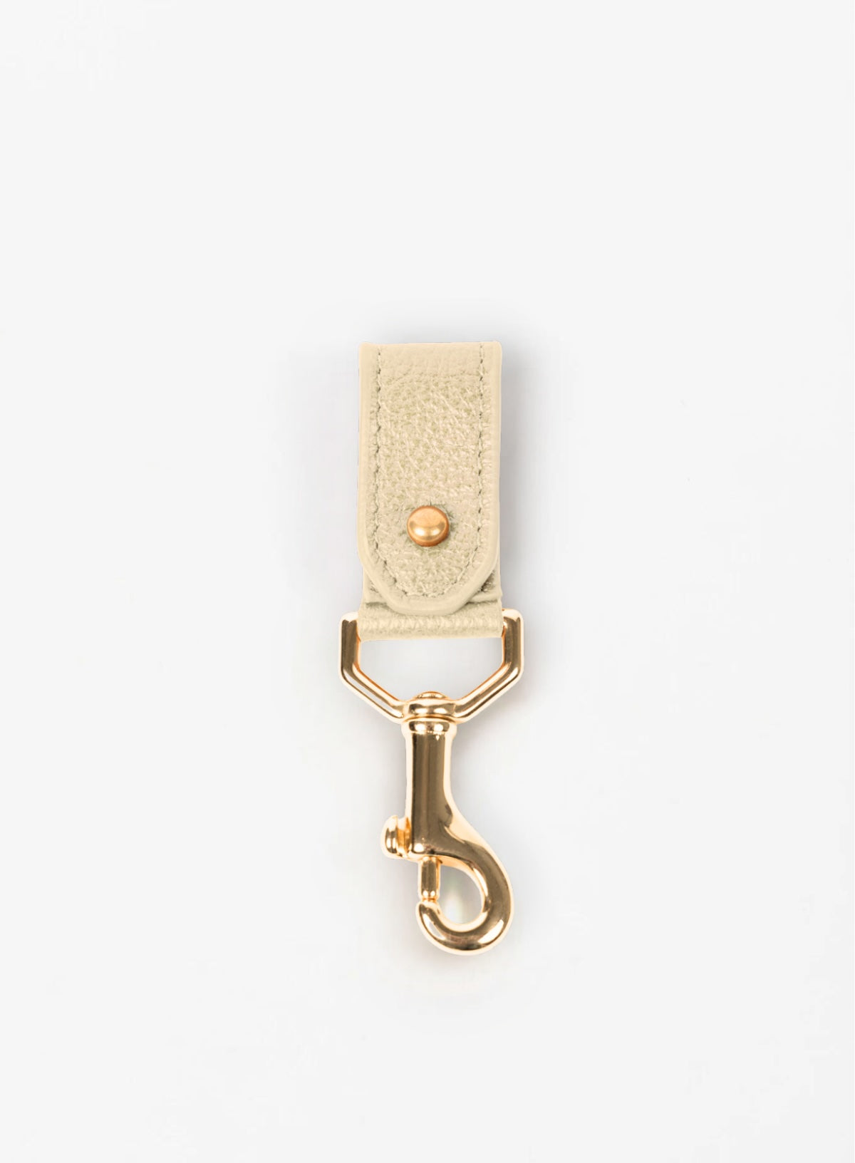 key chain from our ethically crafted accessories in bone leather and gold coated metal showcasing front view.