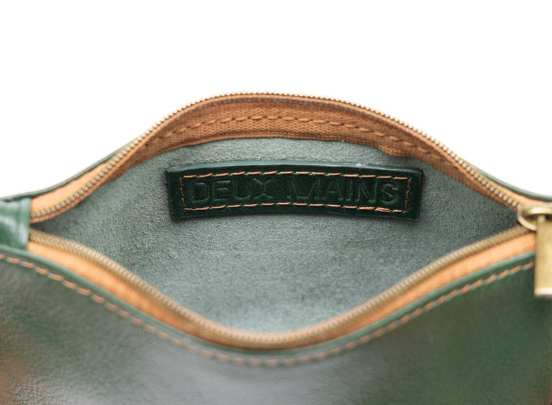    large pouch from ethically crafted accessories in green showcasing interior view.