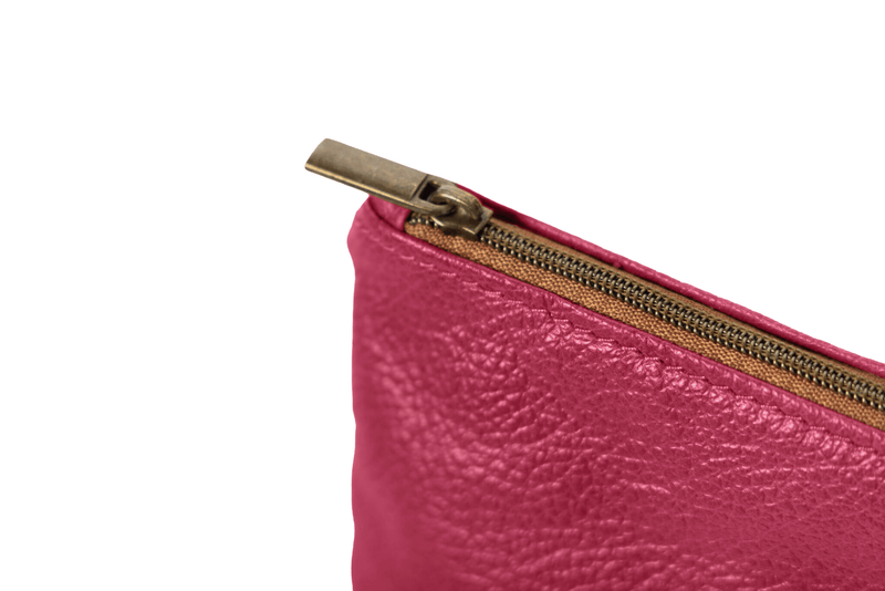 large pouch from ethically crafted accessories in pink showcasing close up view.