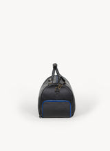 mission essential duffle bag in black with blue stitching side-view.