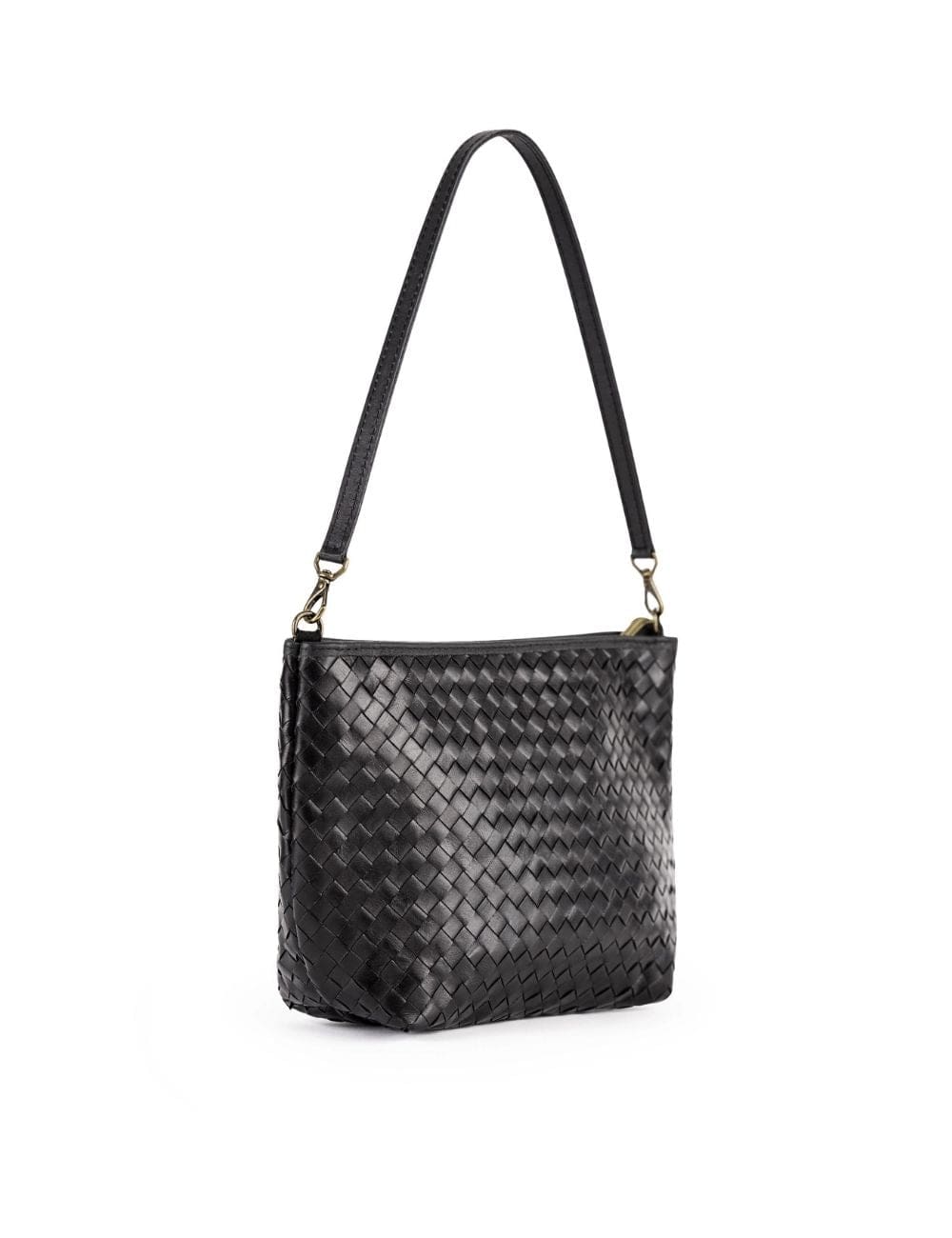 Black woven handbag with a strap on a white background. Made in Haiti