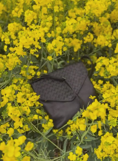 envelope crossbody in black from spring/summer collection video.