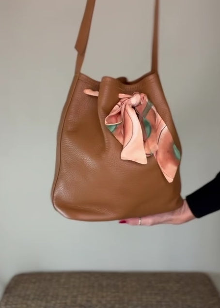 founder showing off bag.