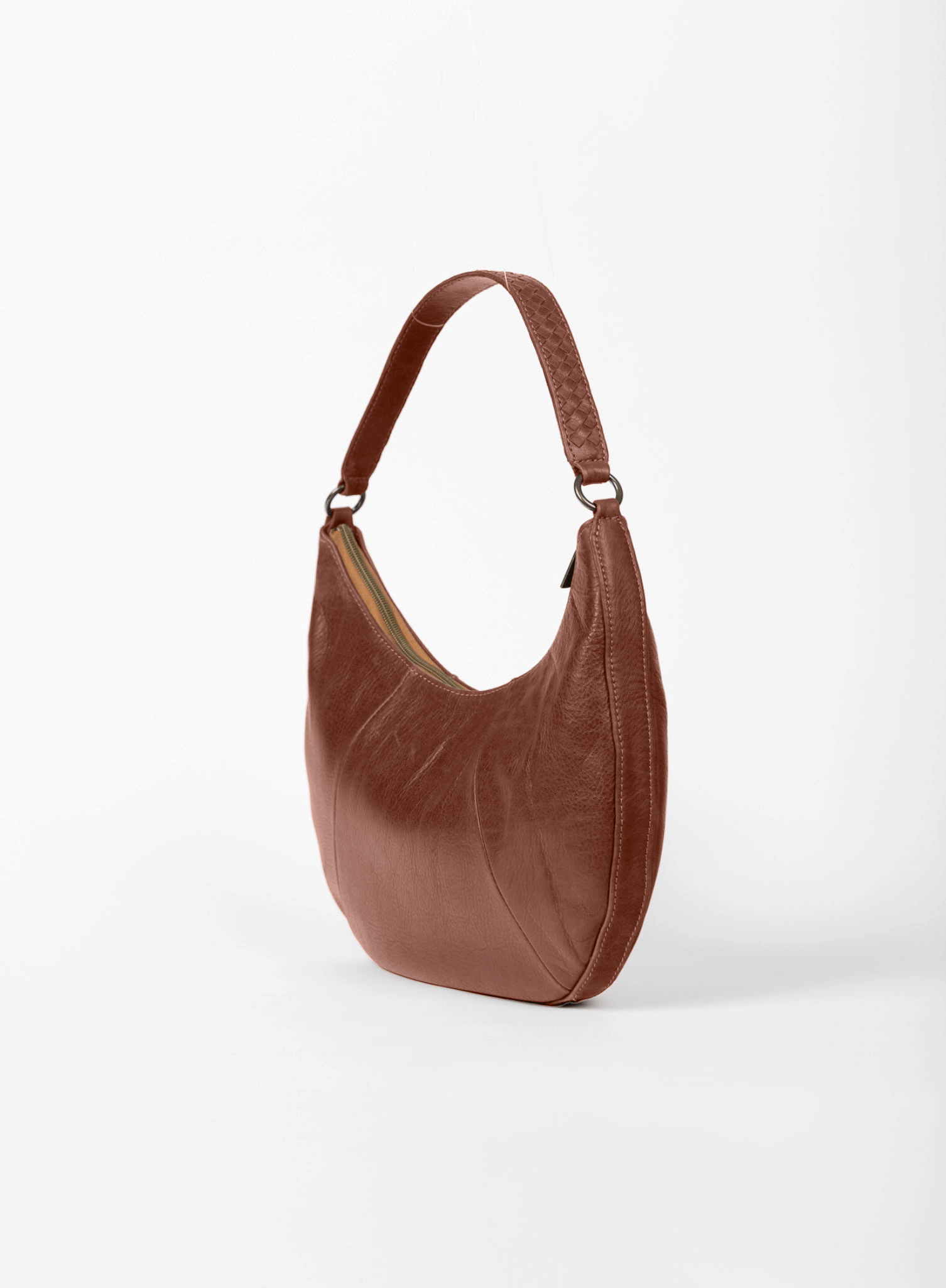 saddle shoulder bag from womens bags in brown showcasing side view.