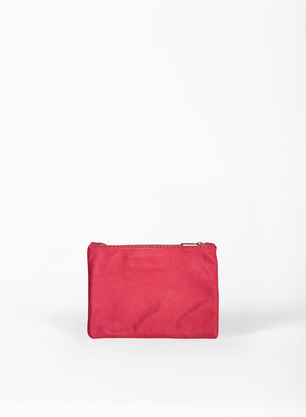 smalll pouch from sustainably hand made accessories in pink showcasing back view.