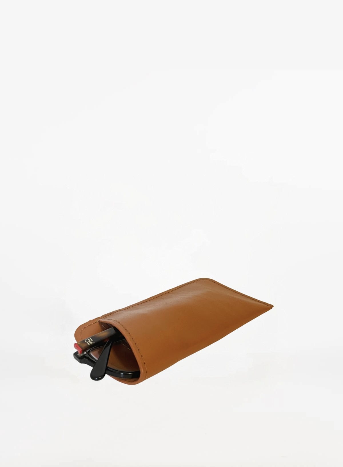 Cognac leather glasses case side view.
