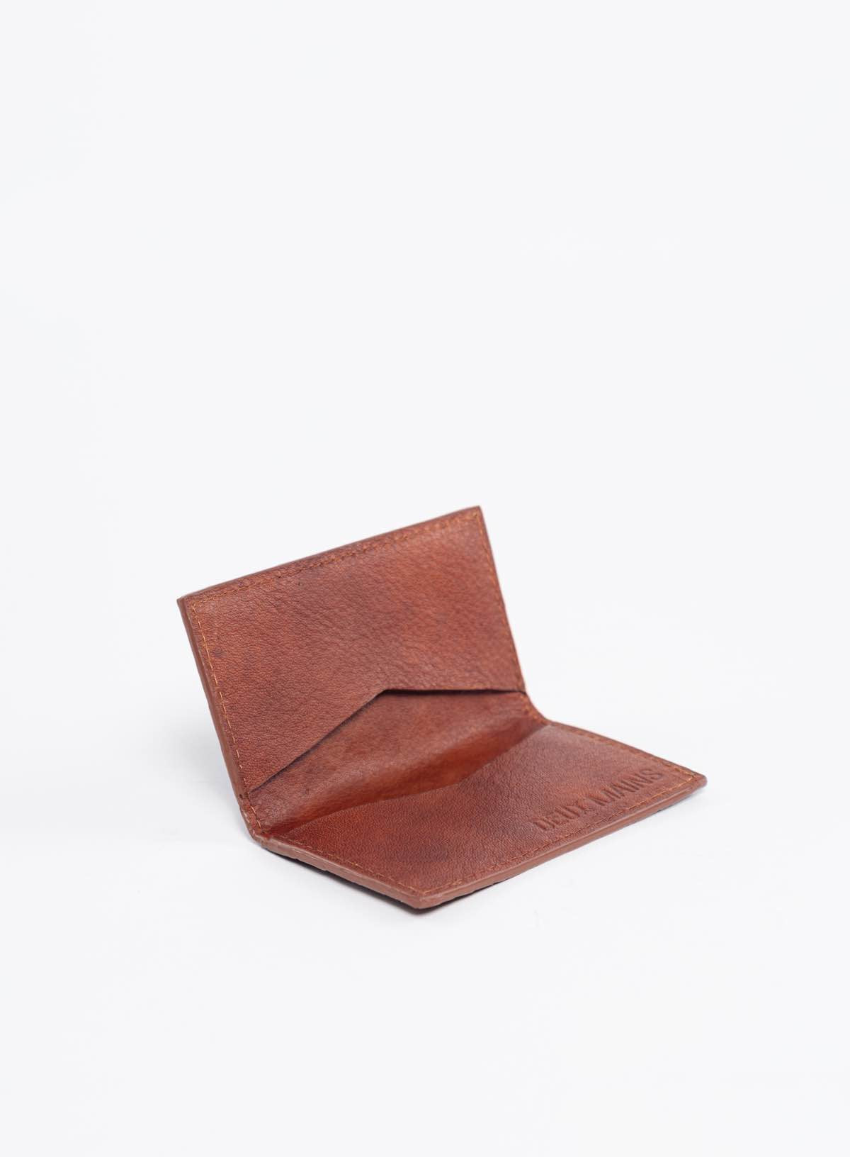 simple woven wallet  in mahogany interior view from the fall collection.